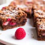 Decadent raspberry chocolate crumb bars: a sweet, delicious treat.