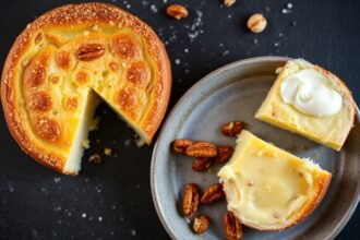 Golden baked brie: sweet, nutty cheese delight, perfect appetizer.