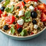 Flavorful Greek quinoa salad with vibrant Mediterranean ingredients.