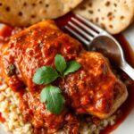 Savoring Pipian Rojo with chicken: rich, flavorful Mexican tradition.