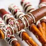 Sweet salty chocolate-covered pretzel rods, perfect snack.