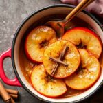 Warm baked apples with cinnamon, a cozy seasonal delight.