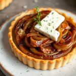 Savory caramelized onion and feta tart, packed with irresistible flavor.