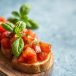 Vibrant bruschetta tomato with fresh basil, perfectly balanced and mouthwatering.