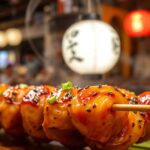 Delicious Japanese chicken skewers: savory tsukune secrets revealed.