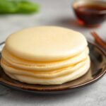 Fluffy Japanese soufflé pancakes, light and airy dessert perfection.