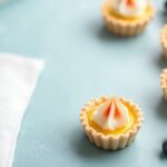 Irresistible mini fruit tarts showcasing dessert art and joy.
