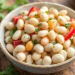Zesty marinated white bean salad, fresh and flavorful.