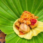 Nacatamales Unwrapped: Delicious Nicaraguan chicken tamale delight.