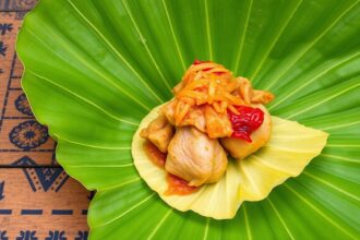 Nacatamales Unwrapped: Delicious Nicaraguan chicken tamale delight.