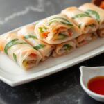 Crispy Cha Gio rolls: flavorful indulgence, artfully fried for ultimate bliss.