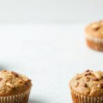 Delicious banana nut muffins, sweet and crunchy perfection.