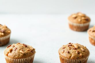 Delicious banana nut muffins, sweet and crunchy perfection.