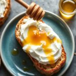 Whipped ricotta toast with honey, a sweet and creamy delight.
