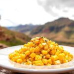 Authentic choclo con queso: Andes' timeless corn and cheese delight.