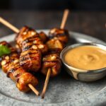 Sizzling satay skewers with perfect peanut sauce recipe.