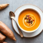 Golden comfort soup: creamy roasted sweet potato recipe.