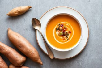 Golden comfort soup: creamy roasted sweet potato recipe.