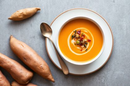 Golden comfort soup: creamy roasted sweet potato recipe.