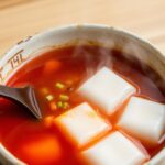 Savoring Sundubu: A steaming bowl of Korea's silky soft tofu stew.