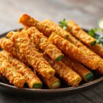 Crispy fried zucchini sticks, a delicious and crunchy snack.