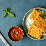 Crispy fried tempeh with vibrant Sambal Matah, a Balinese delight.
