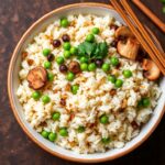 Savory Teriyaki rice pilaf with mushrooms and peas, a delicious dish.