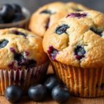 Baking perfect blueberry muffins: fluffy, moist, and delicious recipe.