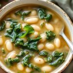Hearty kale and white bean soup, a nutritious classic recipe.