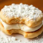 Chile sweet alfajores dusted in coconut delight.