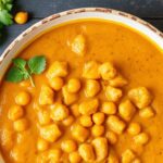 Hearty pumpkin curry with chickpeas, a flavorful fall feast.