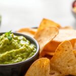 Perfect pair: guacamole with crunchy tortilla chips.