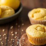 Zesty lemon poppy seed mini muffins, tiny joyful bites.