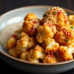 Crispy sticky sesame cauliflower, a flavor-packed delight.