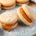 Alfajores Unwrapped: Delicious dulce de leche cookies featured in story.