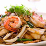 Char Kway Teow Unveiled: Seafood Stir-Fry Delight Explored