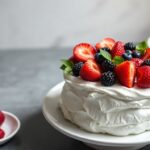 Summer berry pavlova: light, sweet slice of sunshine dessert.