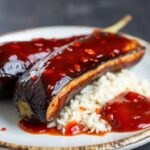 Spicy sweet gochujang glazed eggplant, a delightful dish.
