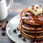 Power-packed chocolate protein pancakes for a delicious morning fuel.