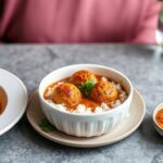 Hearty red lentil kofta curry, vegan delight.