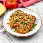 Hearty stuffed roasted vegetables with nutty fonio grain recipe.