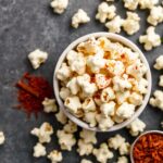 Spicy Indian popcorn twist: delicious fusion flavor.