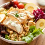 Healthy twist chicken Cobb salad with light dressing.