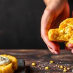 Golden Bites: Delicious sweet corn arepas de choclo, a tasty treat.