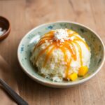 Delicious mango sticky rice, Thailand's tropical sweet delight.